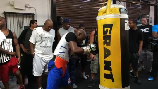 Floyd Mayweather Hitting the Heavy Bag While Training